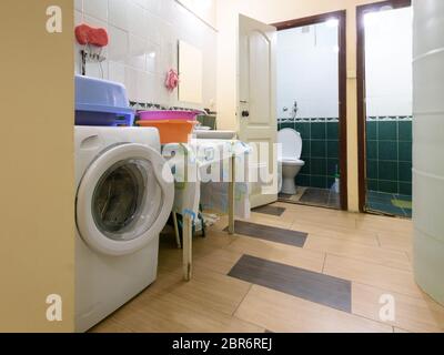 Old washroom with separate toilet and bathroom Stock Photo