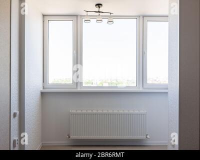 Glazed balcony in the apartment Stock Photo