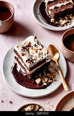 A serving of chocolate hazelnut tiramisu cake on a plate. Stock Photo