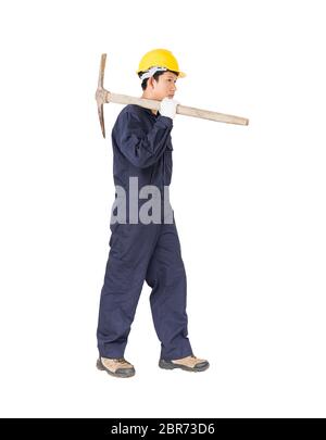 Young man in uniform hold old pick mattock that is a mining device, Cut out isolated on white background Stock Photo