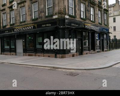 View of the closed Glasgow city centre bar, Hootenany, situated on Howard Street, during the coronavirus pandemic and lockdown, illustrating the Government guidelines to close all non essential businesses and to stay home to slow the spread of the virus are being adhered to. Stock Photo