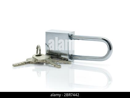 Metallic padlock with three keys isolated on white background Stock Photo
