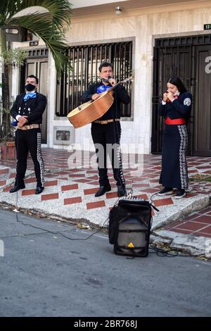 Due to lack of work during Coronavirus outbreak in Colombia, Mariachis are giving social serenades in the streets Stock Photo