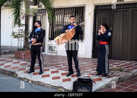 Due to lack of work during Coronavirus outbreak in Colombia, Mariachis are giving social serenades in the streets Stock Photo