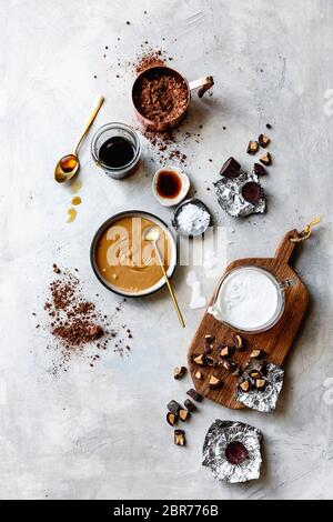 Ingredients for peanut butter cup chocolate fudge popsicles. Stock Photo