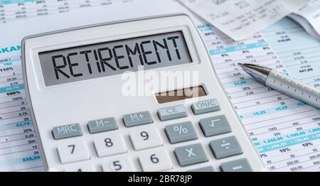 A calculator with the word Retirement on the display Stock Photo