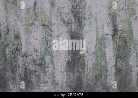 Background with cracked colorful paint. View of old garage door. Stock Photo