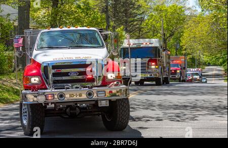 Several Shelter Island emergency vehicles with lights on Stock Photo