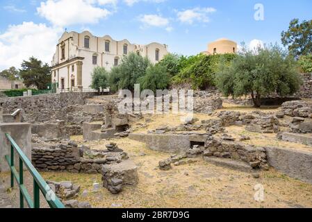 Ruins of the ancient huts and the Church of the Immaculate in Lipari, Aeolian Islands, Italy Stock Photo