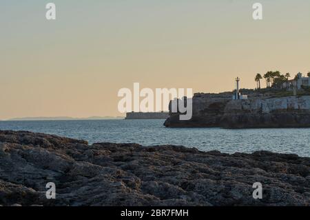 Small Lighthouse on Mallorca torre porto petro, water activities Stock Photo