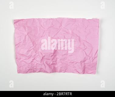 Crumpled Pieces Of Pink Fluorescent Tape Isolated On White