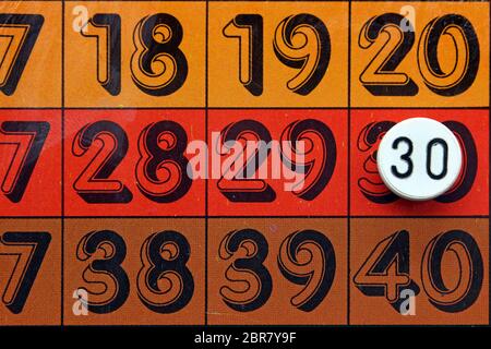 Table and chip on the number 30, concept Stock Photo