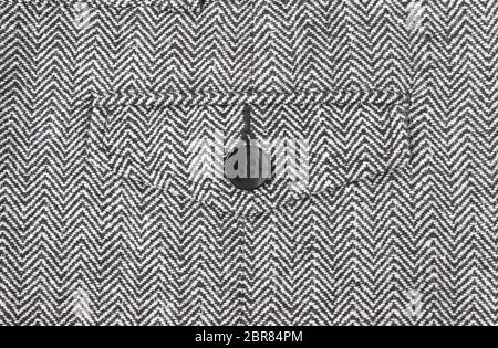 1 Black Button on Zig Zag Pattern or Triangle Pattern on Center Frame. 1 Button on Zig Zag Pattern or Triangle Pattern for apparel design Stock Photo