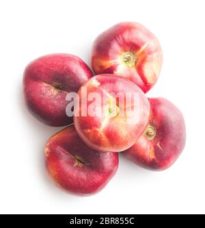 Ripe flat nectarines isolated on white background. Stock Photo