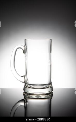 Empty clear beer mug, isolated on white background. Stock Photo