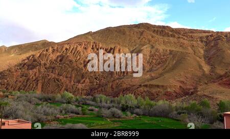 Monkey fingers rock formation near the village of Imzzoudar, Dades Gorge, Morocco, Cliffs of Tamlalt, North Africa - March 16, 2019 Stock Photo