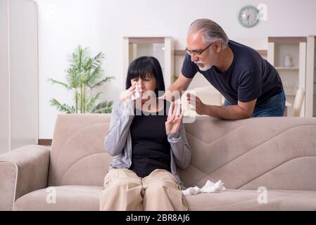 Old couple having argument at the home Stock Photo