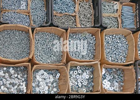 Various Washers Nuts and Bolts in Boxes Parts Stock Photo