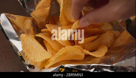 Potato chip inside the package Stock Photo