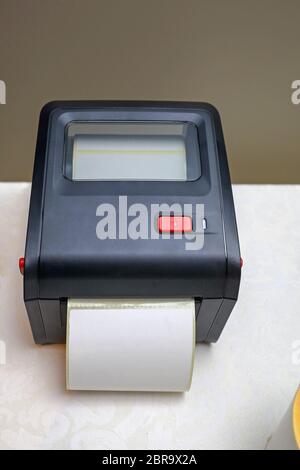 Small Barcode Label Printer Equipment for Distribution Warehouse Stock Photo