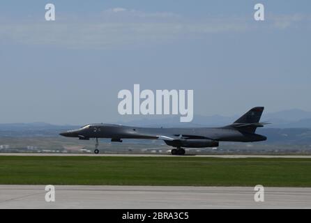 A 34th Bomb Squadron B-1B Lancer taxis down the runway after landing on Ellsworth Air Force Base, S.D., May 20, 2020.  This followed the completion of a long-range, long-duration Bomber Task Force mission to the U.S. European Command area of responsibility. BTF missions provide opportunities to work and train with U.S. allies and partners, while strengthening capabilities by familiarizing aircrew with air bases and operations in different parts of the world. (U.S. Air Force photo by Airman 1st Class Christina Bennett) Stock Photo