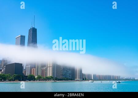 Chicago Skyline with a Low Hanging Fog Cloud over Lake Michigan Stock Photo