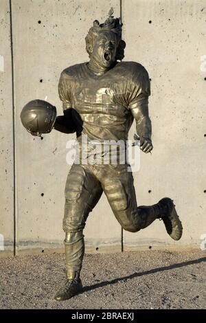 A memorial statue of Pat Tillman at State Farm Stadium reflection pond,  Monday, Dec. 26, 2022, in Glendale, Ariz. The stadium is the home of the  Arizona Cardinals. (Photo by Image of