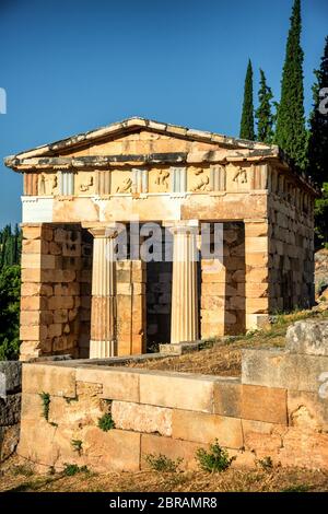Treasury of the Athenians (6th century BC) in Delphi, Greece Stock Photo