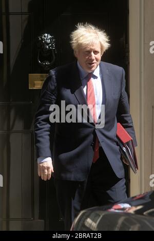 WESTMINSTER LONDON, UK. 20 May 2020. British Prime Minister Boris Johnson leaves 10 Downing Street to attend the weekly (PMQs) Prime Ministers Questions  at Parliament before the Parliamentary recess to face the leader of the opposition Keir Starmer at the despatch box during the coronavirus crisis. Credit: amer ghazzal/Alamy Live News Stock Photo