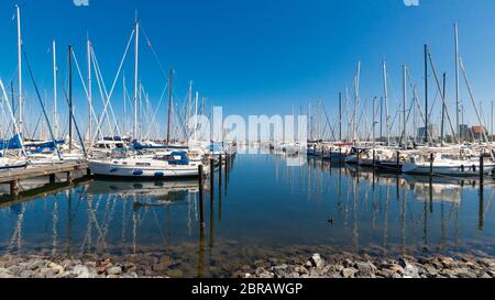 Heiligenhafen, Germany – 24. July 2019: Sailboat port and marina in Heiligenhafen for summer vacationers on the Baltic Sea. Heiligenhafen is a tourist Stock Photo