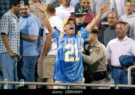 Tempe, United States. 27th Oct, 2003. San Diego Chargers fan with LaDainian  Tomlinson jersey during Monday Night Football game against Miami Dolphins  at Sun Devil Stadium. The Chargers' home game was moved