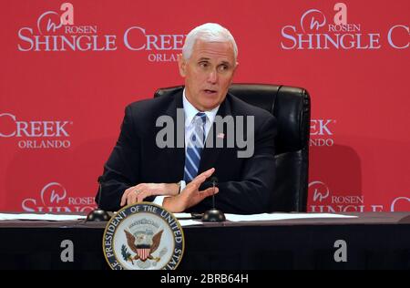 Orlando, United States. 20th May, 2020. U.S. Vice President Mike Pence participates in a roundtable discussion with Florida Gov. Ron DeSantis and hospitality and tourism industry leaders to discuss Florida's phased economic reopening during the coronavirus pandemic. Credit: SOPA Images Limited/Alamy Live News Stock Photo