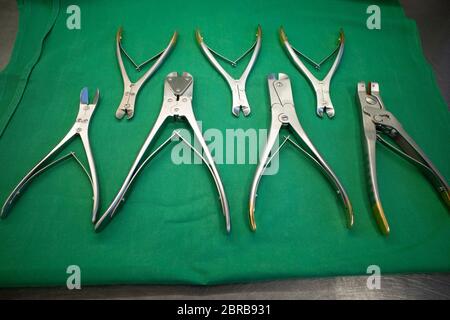 different surgical side cutters lie side by side on one surgical drape Stock Photo