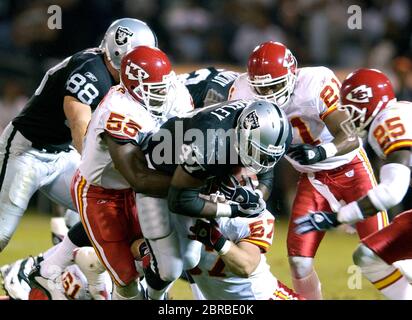 Oakland Raiders running back Michael Bush stretches during pre-game warm  ups at Invesco Field at Mile High on October 24, 2010 in Denver. UPI/Gary  C. Caskey Stock Photo - Alamy