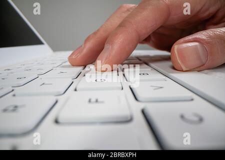 Using laptop computer Stock Photo
