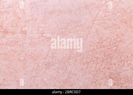 Texture of light pink old marble material with cracked pattern, macro background. Structure of rose ancient stone, backdrop from mineral tile, closeup Stock Photo
