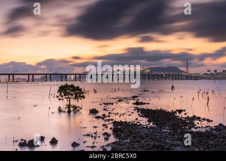 Shenzhen Bay Bridge from Lau Fau Shan at sunset, Hong Kong Stock Photo