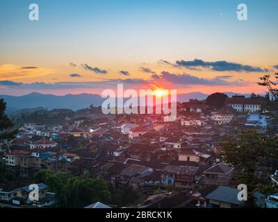 Aerial view of Phongsali, North Laos near China. Yunnan style town on scenic mountain ridge. Travel destination for tribal trekking in Akha villages. Stock Photo