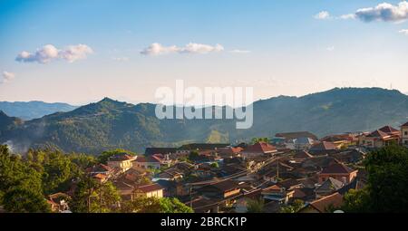 Aerial view of Phongsali, North Laos near China. Yunnan style town on scenic mountain ridge. Travel destination for tribal trekking in Akha villages. Stock Photo