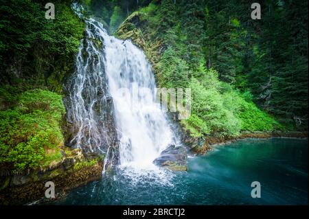 Red Bluff Bay, Southeast Alaska, USA offers stunning scenery and beautiful waterfalls to visitors on small ship adventure cruises. Stock Photo
