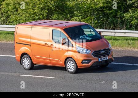 2019 ORANGE Ford Transit Custom 320 Limitd Vehicular traffic moving vehicles, cars driving vehicle on UK roads, motors, motoring on the M6 motorway highway Stock Photo