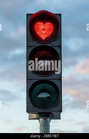 Traffic light with red heart, Akureyri, Iceland Stock Photo