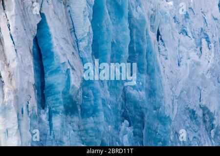 Sawyer Glacier, Tracy Arm Fjord, Southeast Alaska, is an active tidewater glacier appreciated by tourists on small ship cruises and boat tours. Stock Photo