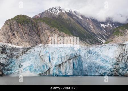 Sawyer Glacier, Tracy Arm Fjord, Southeast Alaska, is an active tidewater glacier, and frequent calving events are appreciated by tourists on small sh Stock Photo