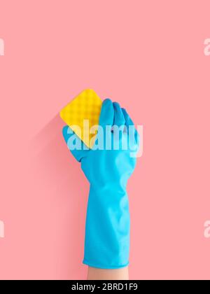 hand in blue rubber glove holding yellow cleaning sponge, cleaning and disinfection for good hygiene isolated on pink background with copy space