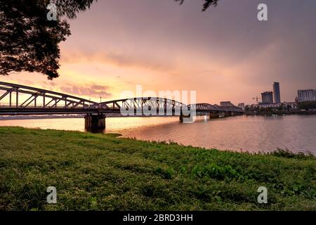 Panoramic photo of Trang Tien Bridge in Hue at sunrise. Truong Tien Bridge is an important historical symbol of Hue. For more than 100 years of existe Stock Photo