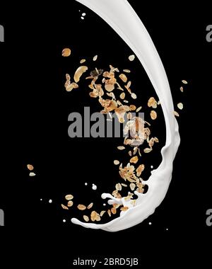 muesli with milk splash isolated on white Stock Photo