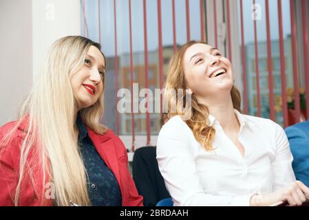 happy office workers managers laughing at meeting Stock Photo