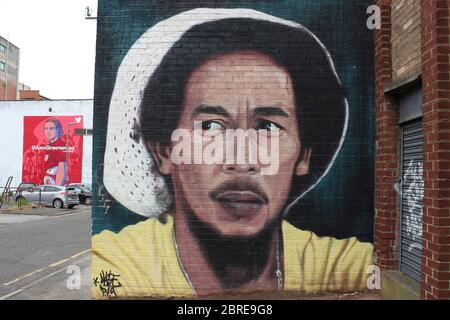Portrait Of Bob Marley by French Artist Akse - Graffiti of Alex Greenwood in Background Fabric District, Liverpool, UK Stock Photo