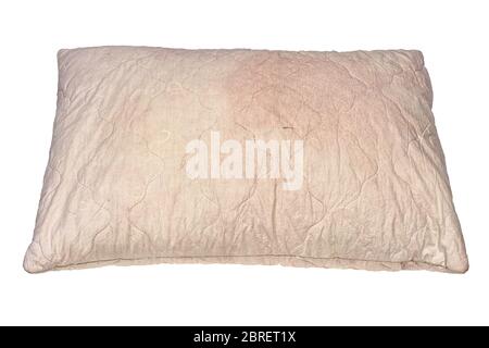 dirty used spotted pillow isolated on white background in slanted frontal perspective Stock Photo